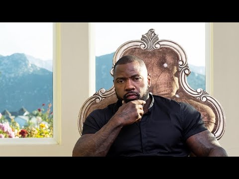 Mike Rashid seated in an ornate chair, from the official Kingmaker documentary thumbnail